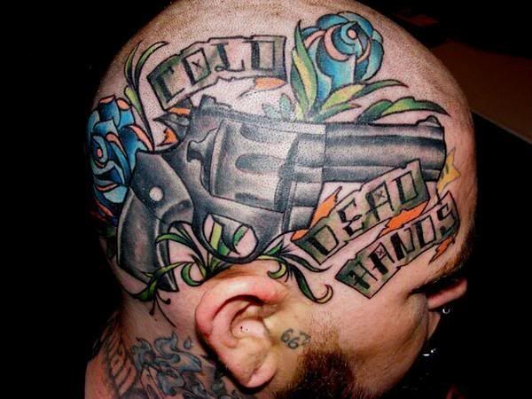 skin rip tattoos heres how much i love guns.. this is my head tattoo i got a 