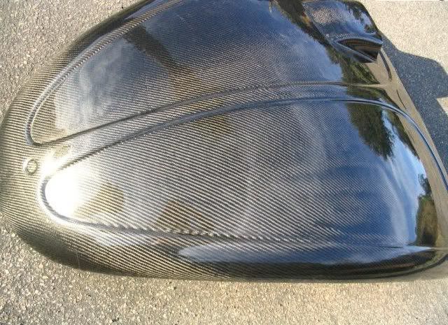 http://i31.photobucket.com/albums/c365/dumone/carbonfibrebonnet.jpg