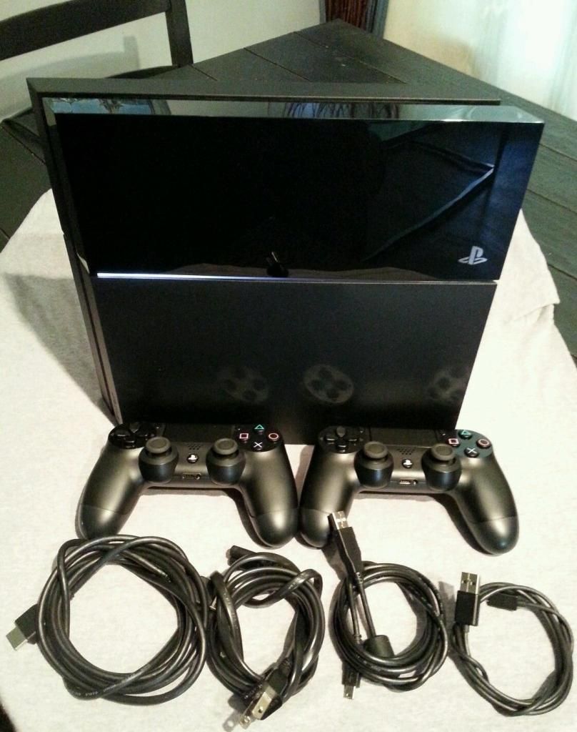 Cần bán PS4 hệ US + 2 tay + PS Camera + vài game PS4