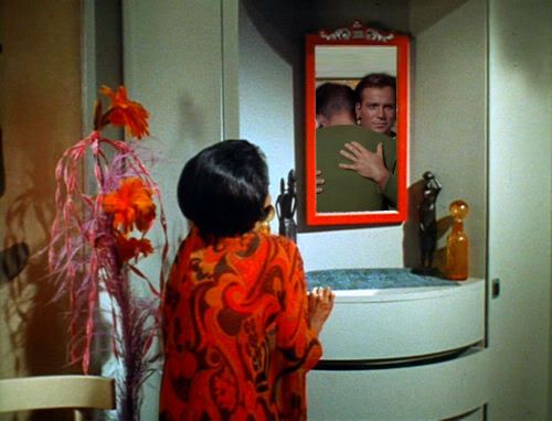 MenInTheMirror.jpg